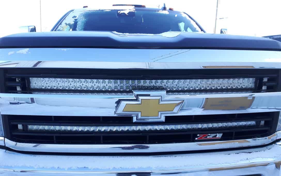 Extreme Series 50" Curved Single Row Light Bar installed into lower part of Chevy grill
