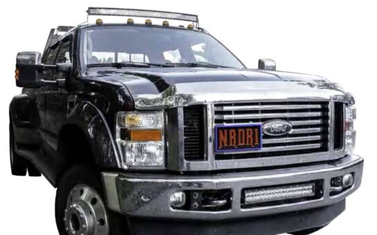Ford Super Duty with 50" Curved Rider Series Bar Mounted on Roof using NMFSR-50